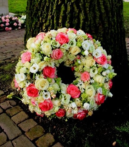 Pam's Flower Garden wreath for a funeral with pink and yellow roses