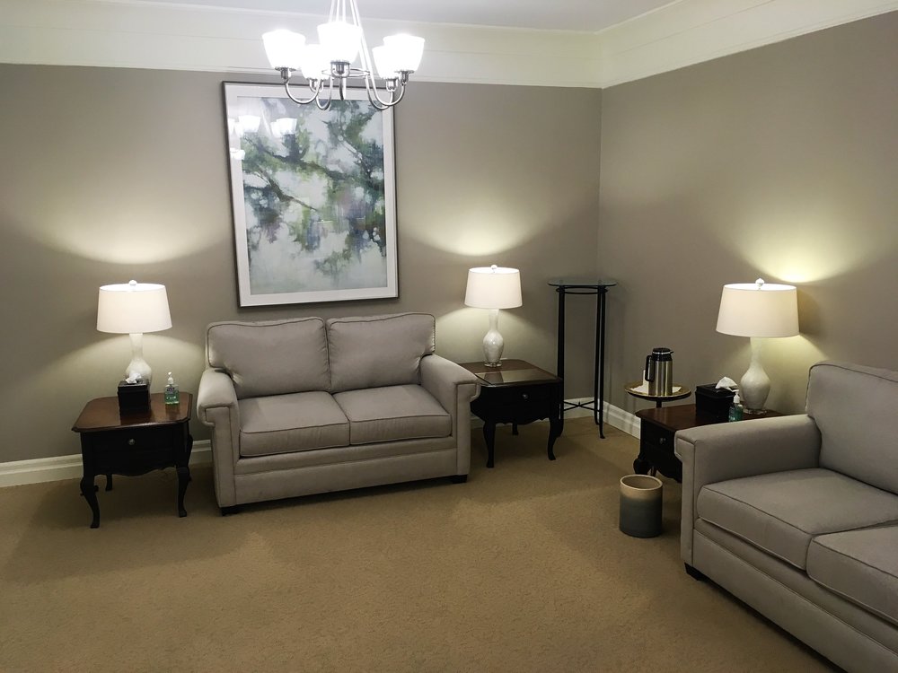 Our largest suite is lined with comfortable James Reid sofas, table lamps, and comforting artwork. 