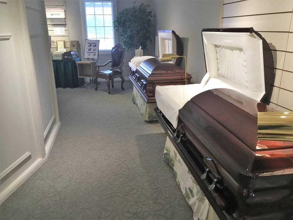 Solid wood caskets in James Reid's Selection Room